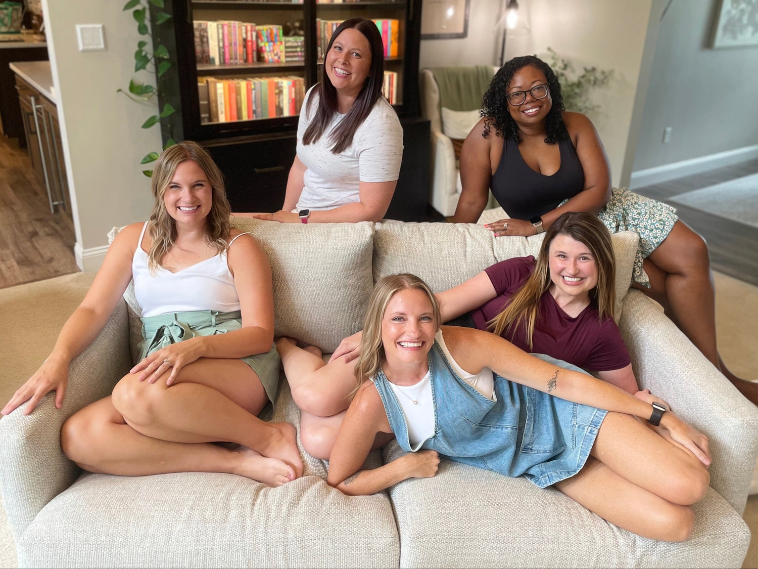 The Kindred Rose Books founders posed and smiling.