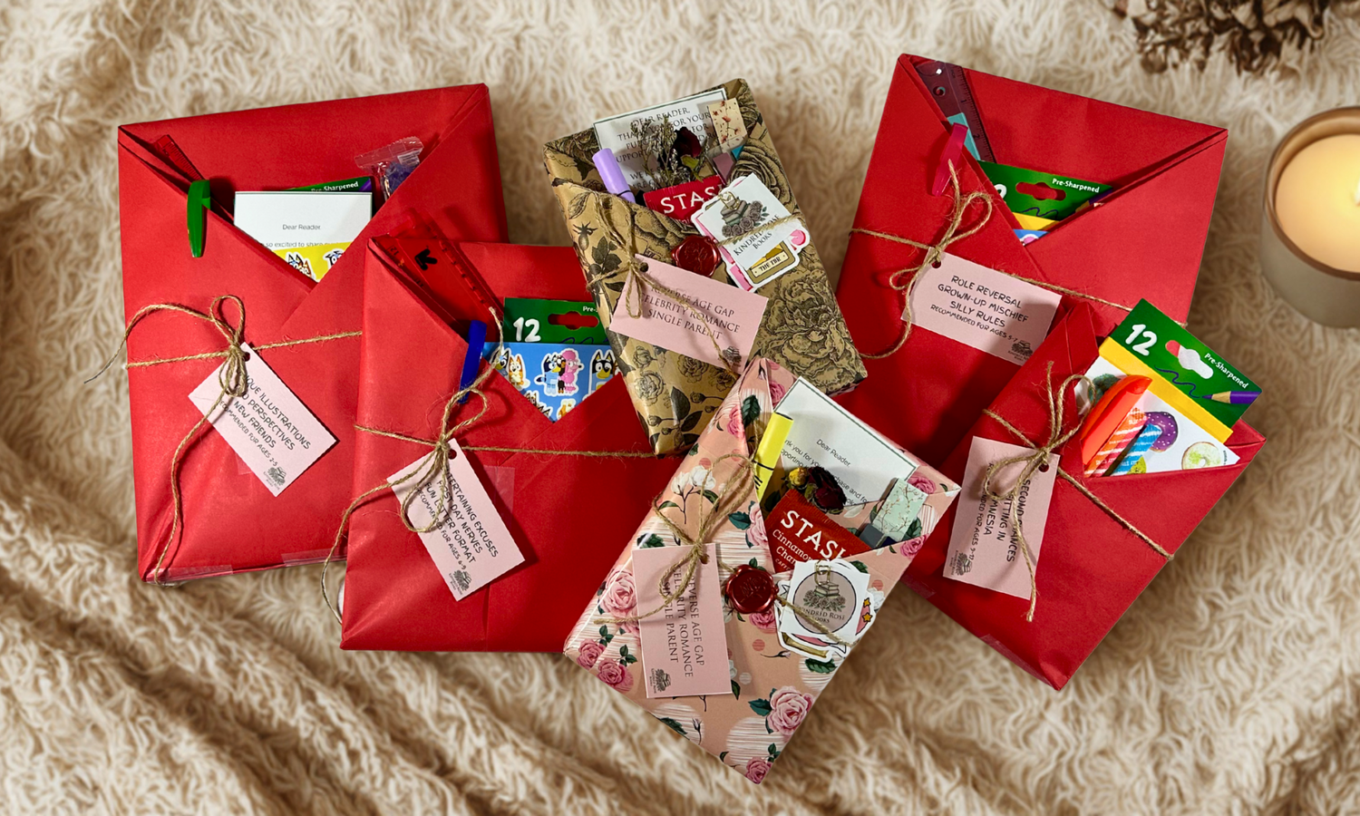 Books wrapped in red and floral wrapping paper. 